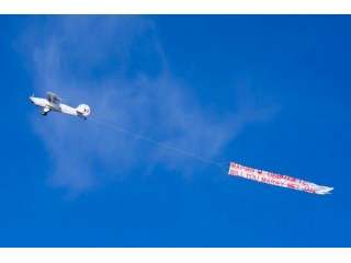 Sky banner – message on the sky in Bucharest